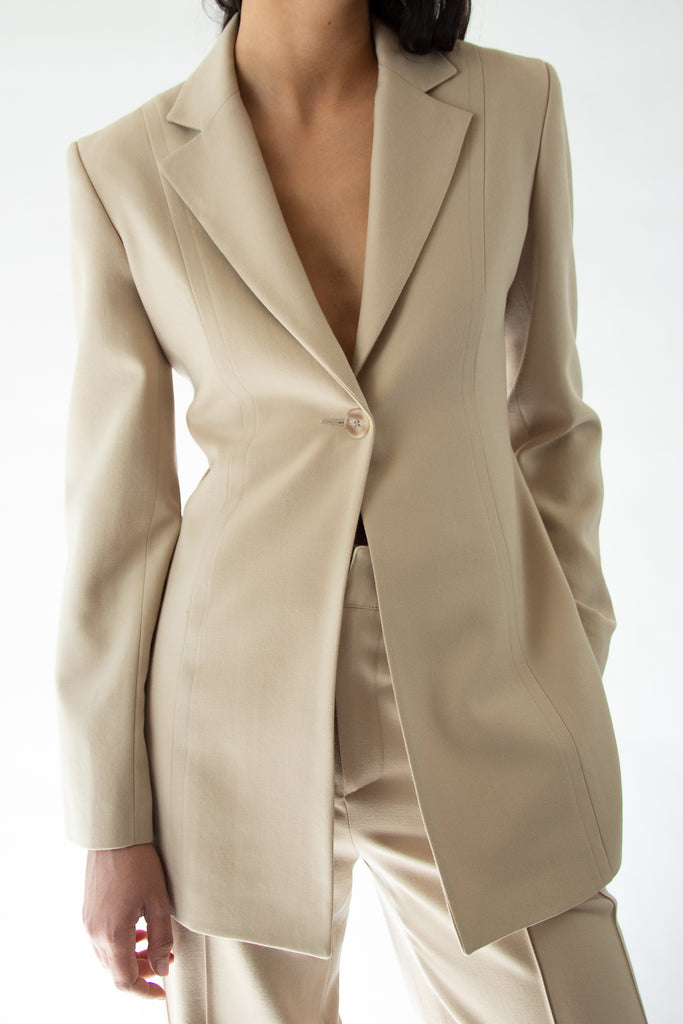 Veste tailleur cintrée en laine beige. Sustainable brand
